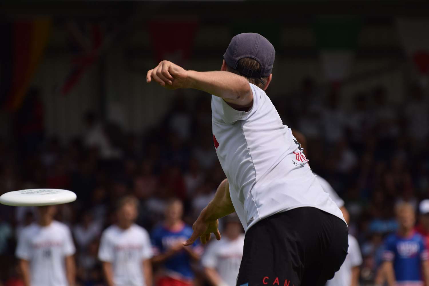 a male player throws an Ultimate Frisbee