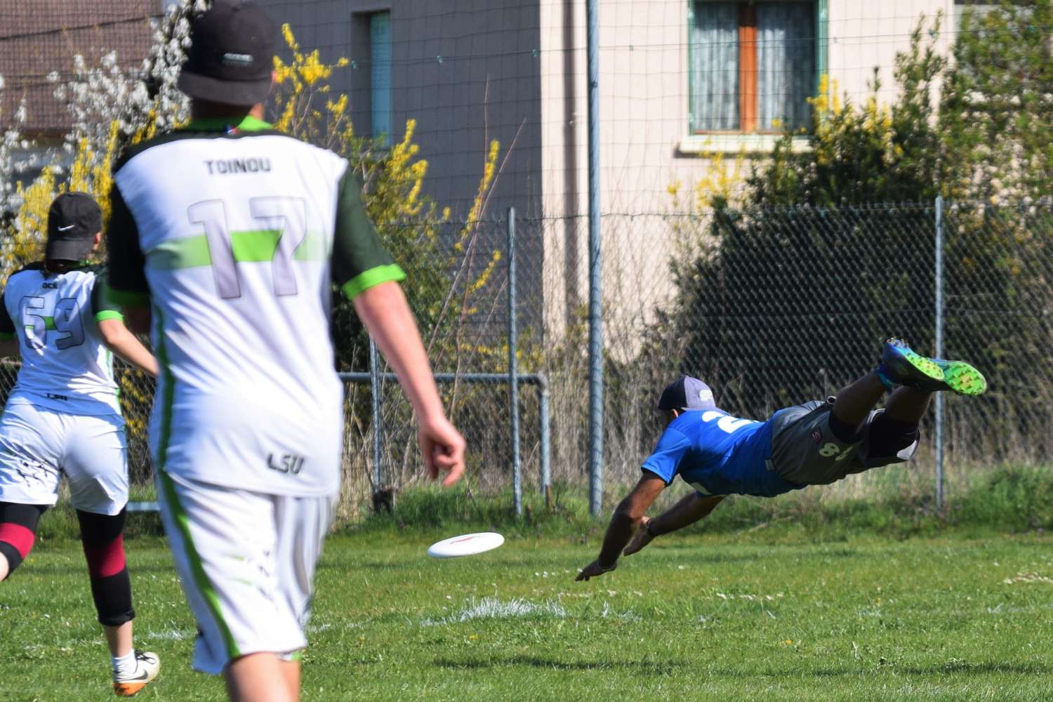 The player tries to catch the Ultimate Frisbee